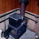 Угловая печь буржуйка в гараж
